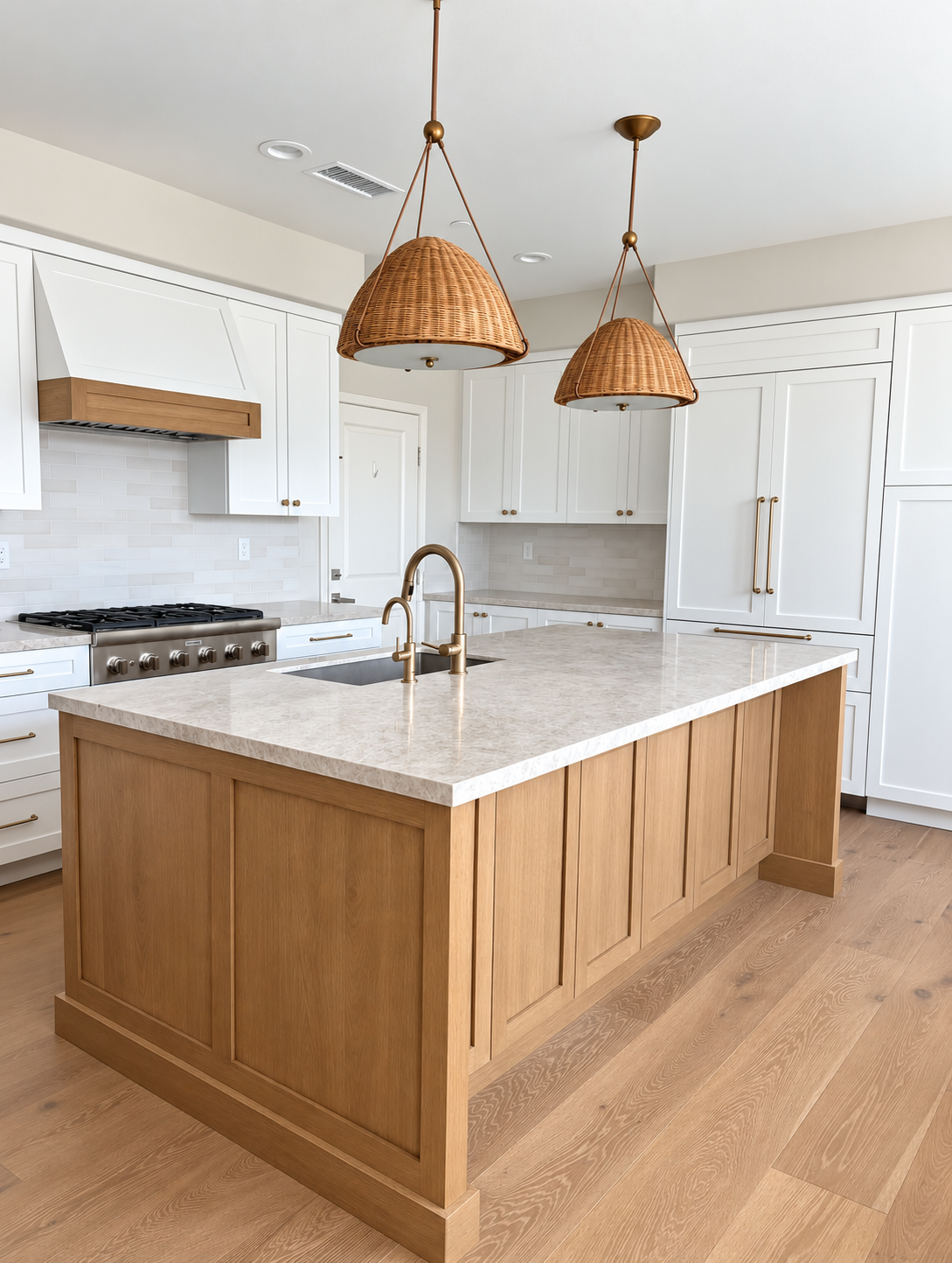 Natural oak Shaker island with white cabinets and woven pendant lights